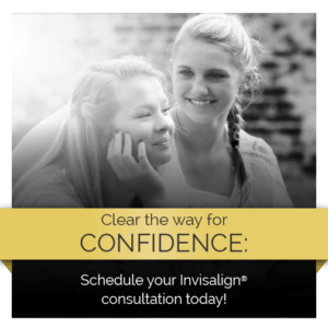 Two smiling young women promoting how Invisalign can straighten your smile.